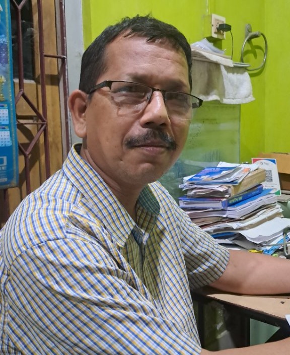 Dr Munindra Saharia
